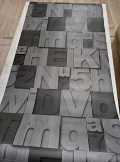 Tapeta 3D písmená a číslice.